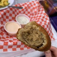 Corn dog was more of a sausage. Good, just not like a typical hot dog-corn dog. Sauces are white bbq and ranch - both vegan   at Sputnik in Denver