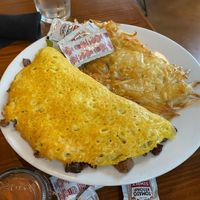 Philly cheesesteak omelette for my mom and she killed it!  at Vegan Avenue in San Antonio
