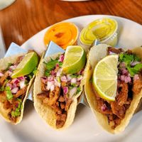 Carne asada tacos and enchiladas verdes at Vegan Avenue in San Antonio