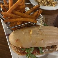Chikn parm hero with sweet potato fries  at Vegan Avenue in San Antonio