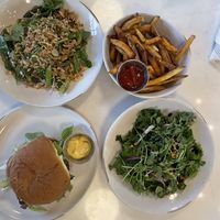 Vegan grain bowl, kale salad with vegan dressing, fries, vegan veggie burger😄 at Clyde's Fine Diner in Des Moines