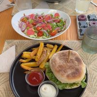 Burger with fries and side saladd  at Mundo Vegan - Vegan World in Funchal