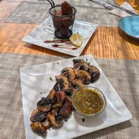 Pastéis de Bacalhau + Mushrooms with Chimichurri at Mundo Vegan - Vegan World in Funchal