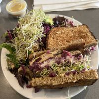 Vegan tofu Reuben w/ salad and nutritional yeast dressing  at The Manatee Cafe in St Augustine
