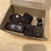 Almond chocolate cookie, brownie, date and tahini chocolate, bounty, twix and pumpkin truffle - overall pretty good! at The Cookiss in Da Nang