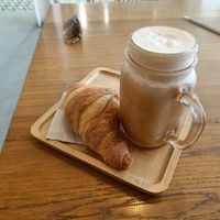 Vegan croissant with iced oat latte at Savage in Figueres