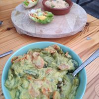 The main dish: green curry with rice and lentils with pine seeds and a salad.  at Albergue el Tulipán de Salas in Salas