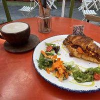 Dirty chai and breakfast croissant   at Vegamo Deli in Mexico City