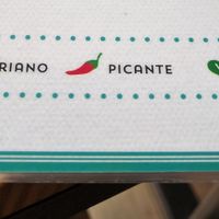 Clearly labeled menu. at Bella Kurva in Granada