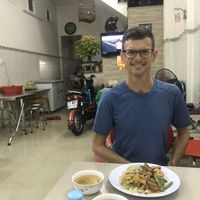 See how happy he is? Yay for Vietnamese Buddhists serving you delicious food   at Am Thuc Chay in Qui Nhon