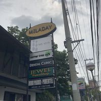 outside sign at Corner Tree Cafe in Makati