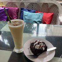 Vegan chocolate cake and vegan smoothie  at Aum Cafe in Varanasi