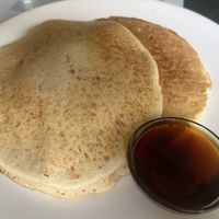 Vegan pancakes with maple syrup  at Aum Cafe in Varanasi