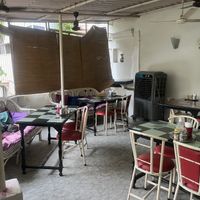 Cozy seating area  at Aum Cafe in Varanasi