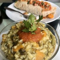 Kichari, with burrito in the background - both vegan! at Aum Cafe in Varanasi