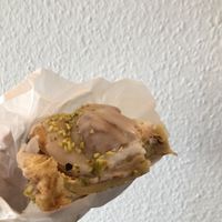 Zimtschnecke (Pistazie) angebissen  at Vollkornbäckerei Hartwich in Berlin