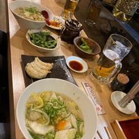 The full shabang (minus 4 eaten dumplings)  at Gyozaoh Dotonbori in Osaka