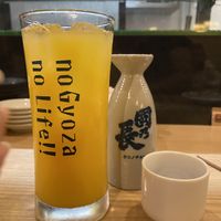 Orange juice and Sake  at Gyozaoh Dotonbori in Osaka