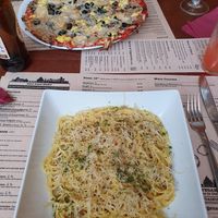 Overly salty carbonara and pizza at Sora Lella Roman Vegan Restaurant in Edinburgh