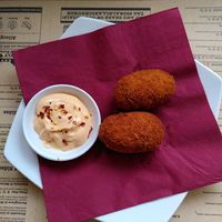 Risotto balls with spicy mayo at Sora Lella Roman Vegan Restaurant in Edinburgh