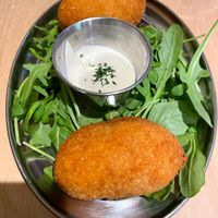 SUPPLI ROMANI - fried Bolognese rice balls filled with mozzarella, accompanied with mayo. at Sora Lella Roman Vegan Restaurant in Edinburgh