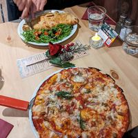 Vegan pizza and calzone at Sora Lella Roman Vegan Restaurant in Edinburgh