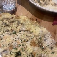 Four cheese and mushroom blanco pizza and carbonaraa  at Sora Lella Roman Vegan Restaurant in Edinburgh