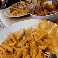 Creamy pasta and very nice crunchy chips at Sora Lella Roman Vegan Restaurant in Edinburgh