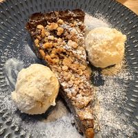 Chocolate, orange tart w hazelnuts — and ice cream   at Sora Lella Roman Vegan Restaurant in Edinburgh