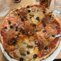Pizza Meat Feast – the meat alternatives were very good and the cheese also surprised us. at Sora Lella Roman Vegan Restaurant in Edinburgh