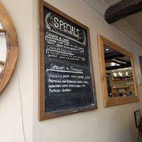 Specials of the day, including my meal and the desserts. at Sora Lella Roman Vegan Restaurant in Edinburgh