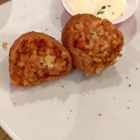 One of two Suppli Romani with sauce at Sora Lella Roman Vegan Restaurant in Edinburgh