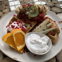 Waffles with peanut butter, chia jam and coconut yoghurt. I should have got maple syrup as it was too dry for me    at Barefoot Eatery in Christchurch
