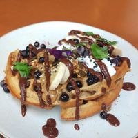 Peanut butter and blackcurrants waffles at Barefoot Eatery in Christchurch