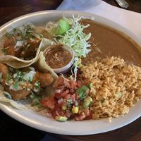 Avocado tacos with refried beans and rice  at Lake Alice Trading Co in Riverside