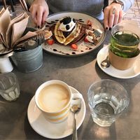 coffee & pancakes! at Curious Yellow Kafe in North London
