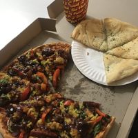 Vegan Apollo pizza, vegan garlic bread and fries at Pompeii Pizza in Palmerston North