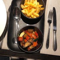 Side dishes, mixed vegtables and slighly seasoned fries. at Van der Valk Hotel in Middelburg
