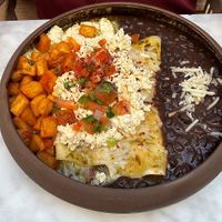 Vegan Breakfast Enchiladas Suiza Style with Black Beans and Papas.   at Toca Madera in Scottsdale