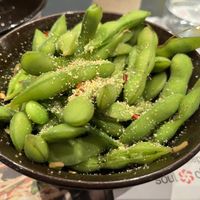 Edamame with chili garlic  at LHR - Wagamama - T3 in West London