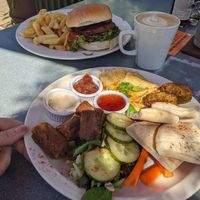 Generous portion sizes - vegan burger and vegan platter at Alpine Coffee Shop and Gallery in Betws-y-coed