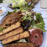 Can barely see the salad under the meat  at Plum Bistro in Seattle