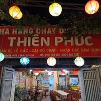 Street signage at night at Thien Phuc in Vinh