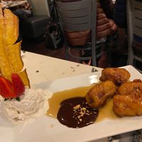 Special vegan dessert of fried banana with ginger chocolate sauce and oat milk ice cream at Viet Thai Cafe in York