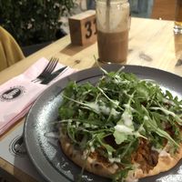 Flatbread with vegan soya mince and a chocolate banana almond milk smoothie   at Estrella in Paphos
