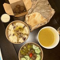 Falafel,soup,tahin sauce,bread,hummuss  at Maha in Brussels