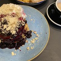 Blueberry cheese pancake and cappuccino with oat milk   at Seven Sundays in Dusseldorf