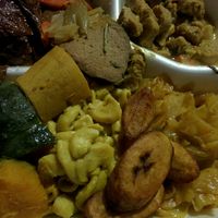 platter of good Vegan eating, BarBQ, seitan, curry, squash, mac & cheese, cabbage, plantain's at Healthful Essence in Atlanta