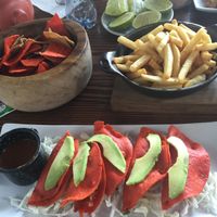 Red potato empanadas, guacamole & corn chips at Chuchito Pérez in Mexico City