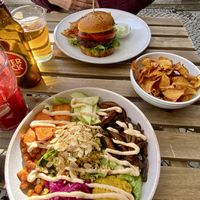 adzuki bean burger, buddha bowl & sweet potato crisps. the juice of the day is also well worth tryingg  at Raiz in Aveiro